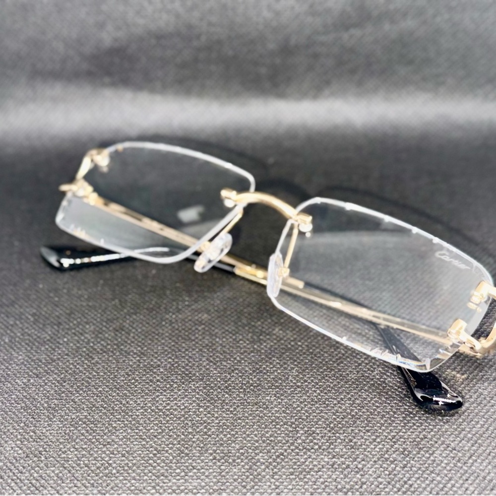 Cartier Gold Rimless Glasses with Red Case